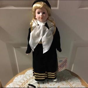 NEW. ELLIS ISLAND DOLL musical